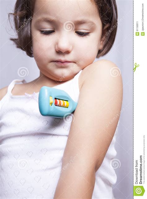 playing doctor with toy thermometer stock image image 61150011