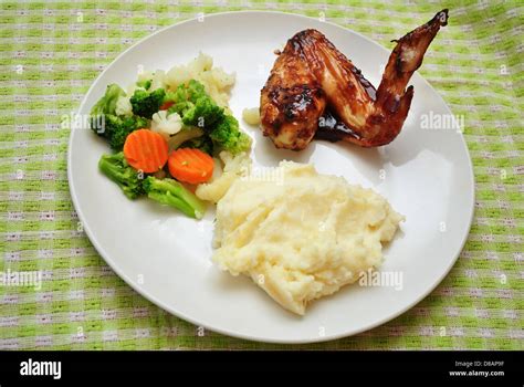 healthy chicken wing dinner  green stock photo alamy