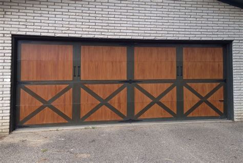 diy faux barn doors  garage door part   painting added stain  give