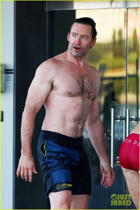 hugh jackman showers off his shirtless body after his beach workout