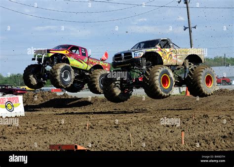 monster trucks race  freestyle competition    road jamboree stock photo royalty