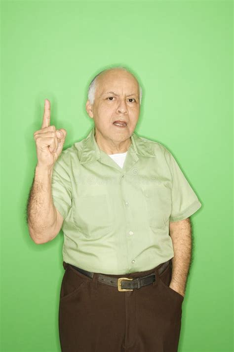 man holding   finger stock photo image  indoors