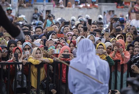 indonesia s aceh canes couples for public shows of