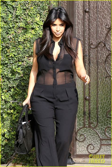 Kim Kardashian Pregnant In Sheer Top En Route To Airport Photo