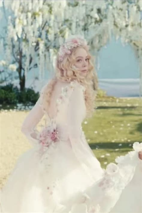 exclusive elle fanning gushes over her stunning wedding dress in
