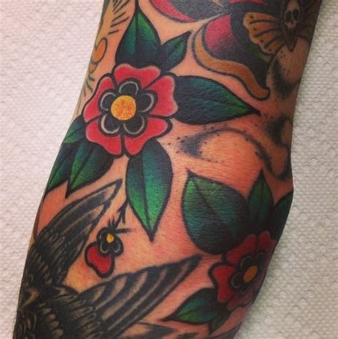 25 Impeccable Traditional Flower Tattoos Traditional