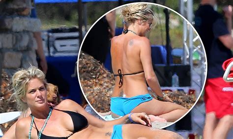 rachel hunter shows off her enviable curves as she hits the beach in bikini for independence day