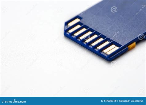 blue sd memory card isolated  white concept stock photo image  electronic chip