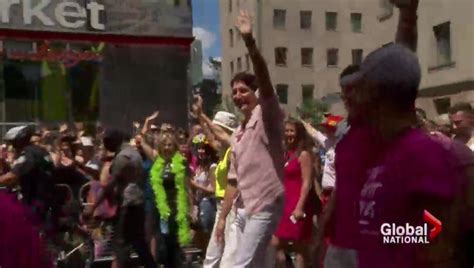 prime minister justin trudeau marches in toronto pride parade