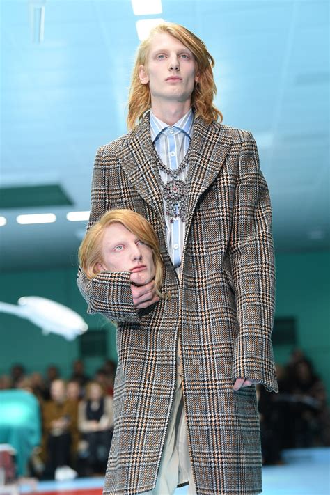 the gucci fall 2018 show included faux severed heads
