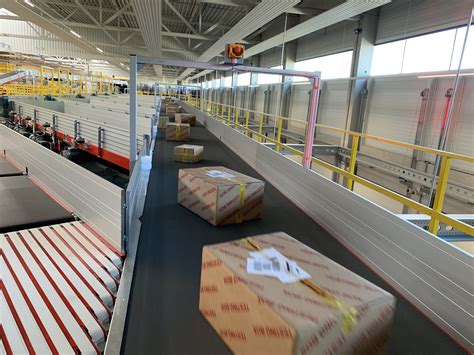 vanriet supplies  sorting system  dhl  austria parcel  postal technology international