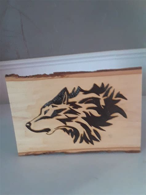 howling wolf wood burning      wood slab  pyrography mystical wolf