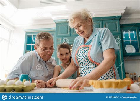 Granny Rolls Out The Dough Stock Image Image Of Little 139940841