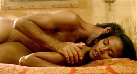 laura gemser naked bush and tits in sex scene from emanuelle and the