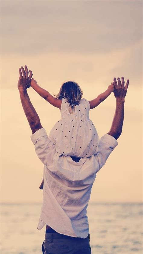 father and daughter daughter sitting on dad shoulder love hd phone