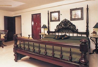 traditional carved rosewood bed  kerala india
