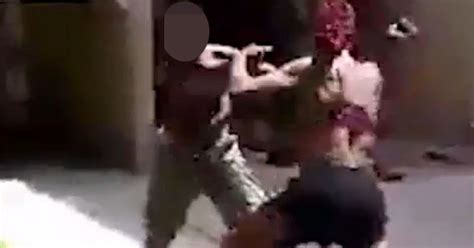 Muscle Bound Woman Beats Up Man And Punches Him Repeatedly In The Head