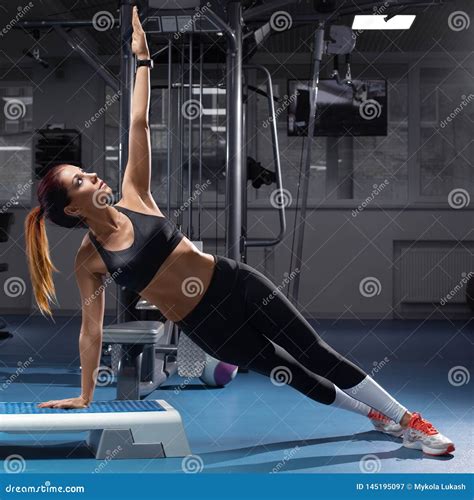 fitness woman  planking exercise   gym sporty girl workout