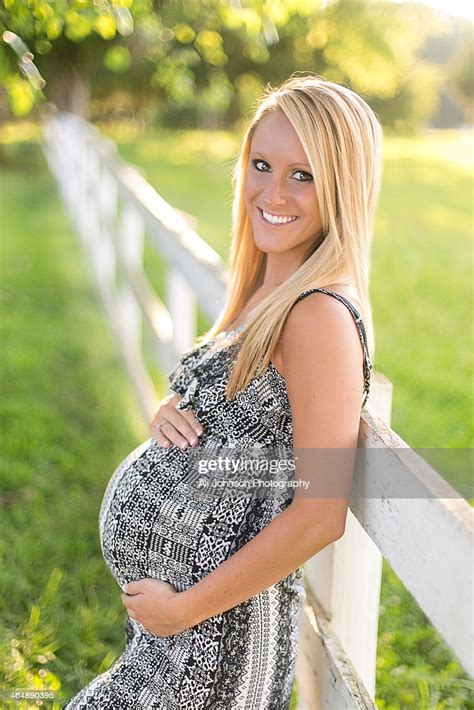 beautiful pregnant woman with long blonde high res stock