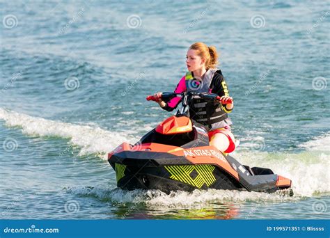 Jet Ski Watercraft Beautiful Caucasian Woman Driver Driving Water Bike