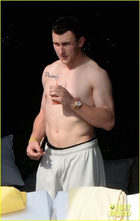 shirtless johnny manziel makes out with his girlfriend in