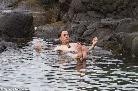 robert downey jr s pregnant wife susan strips down to her bikini as couple take a dip in hawaii