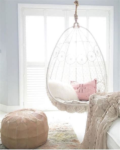 the gypsy hanging chair hand weaved with white rope photo by thesaltyhome