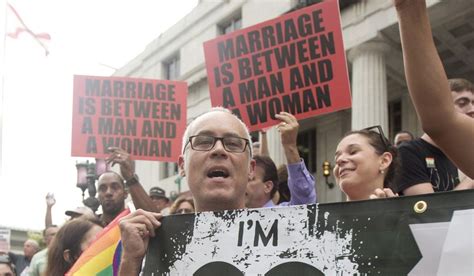 people for and against same sex marriage stage protests