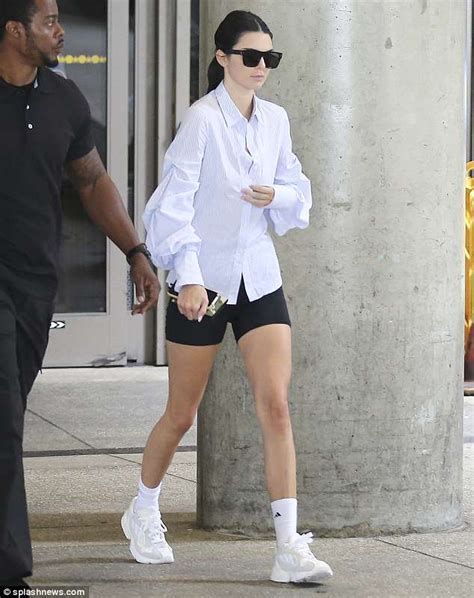 kendall jenner accentuates her figure in skintight cycling shorts