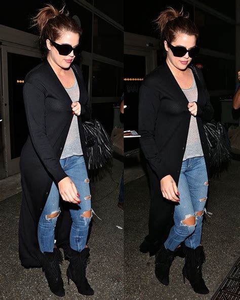 khloe kardashian flashes bra in sheer shirt and black fringe boots
