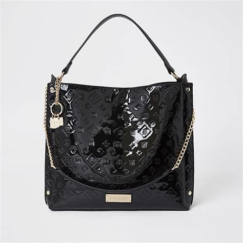 black patent embossed slouch handbag river island