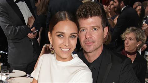 robin thicke and his 20 year old girlfriend april love geary make their debut as a couple at