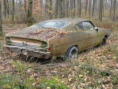 a beautiful abandoned car found in a forest junkyard cars abandoned
