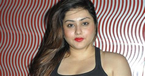 hot babe namitha busting out big time in a tight black