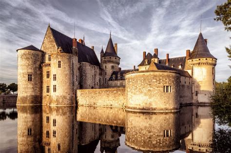 chateau castle  sully sur loire  sunset stock image image  loire attraction