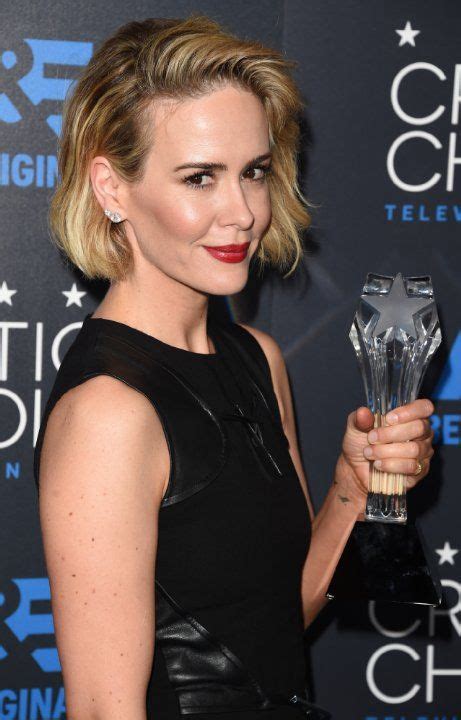 The Actress Is Holding Up Her Award For Outstanding Performance In A