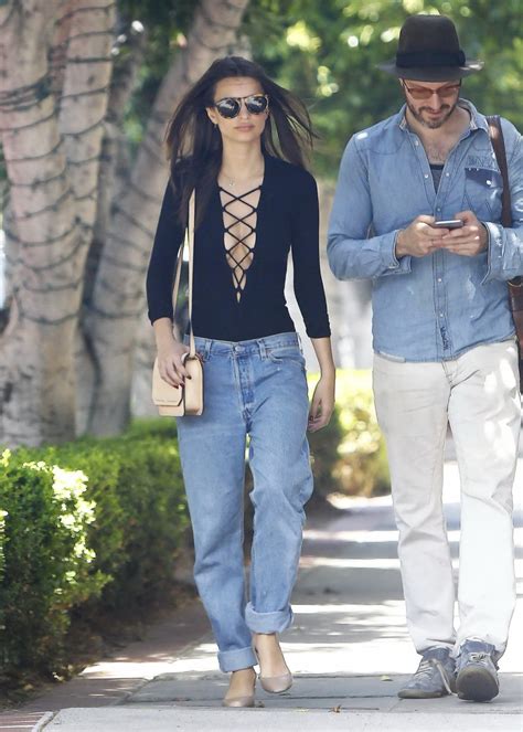 Emily Ratajkowski Braless Showing Huge Cleavage In Black Top And Jeans
