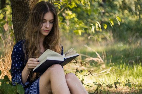 girl reading  book  summer forest high quality people images