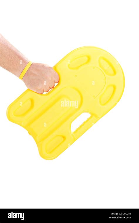 male hand holding  yellow swimming float stock photo alamy