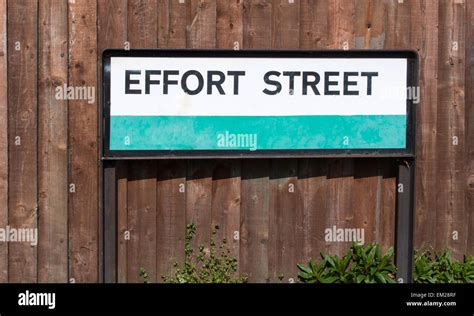 maximum effort  maximum results success  dependent  effort concept road sign london uk