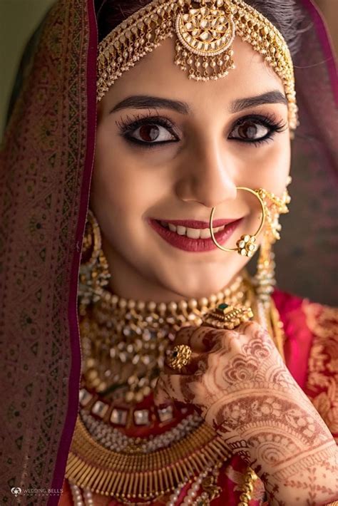 Traditional Indian Bride In Red And Gold Frugal2fab Indian Bride Poses