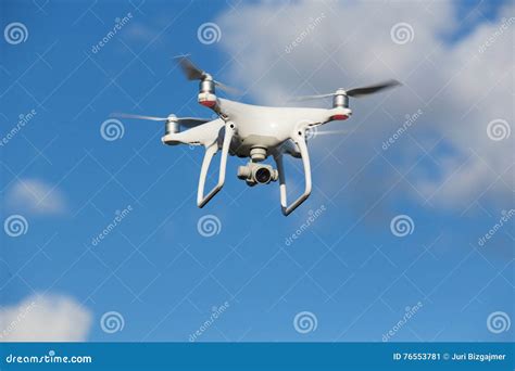 flying quadcopter  blue sky stock image image  quadcopter handset