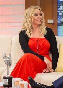 carol vorderman subtly shows off famous derriere in fitted