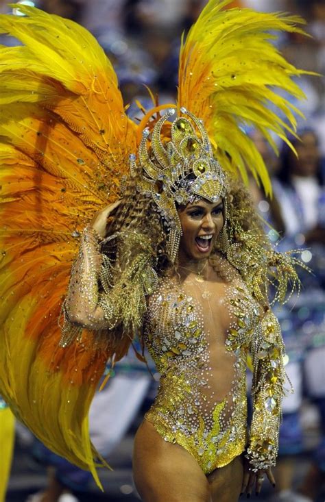 the samba dancers dressed in their bikinis sequins and feathers at the rio carnival 2014 are
