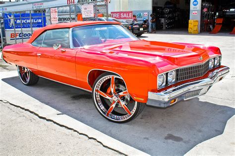 rapper rick rosss  impala donk big rims custom wheels