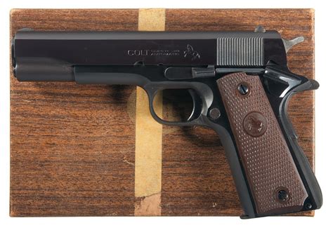 excellent colt super  semi automatic pistol  matching box