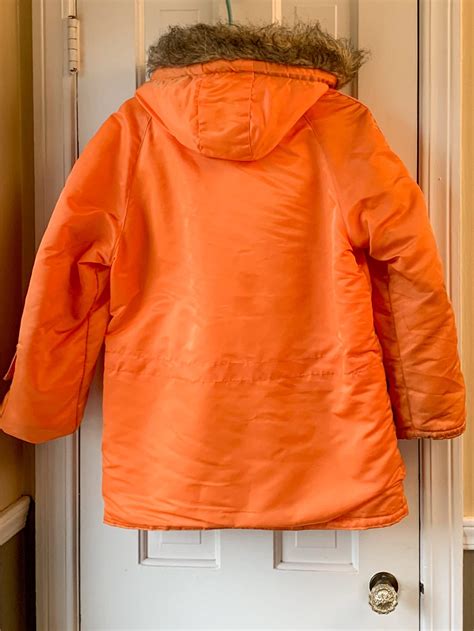 vintage  orange parka  faux fur trimmed hood mod winter