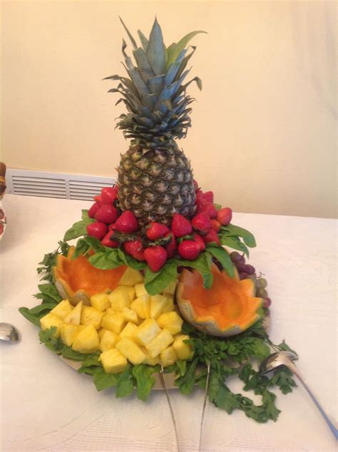 pineapple strawberries   fruits  arranged   shape