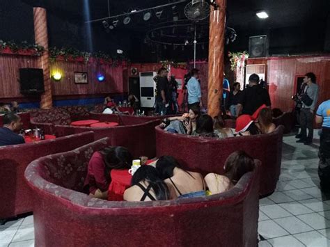 police raid alleged sex den in makati 31 women rescued news gma news online