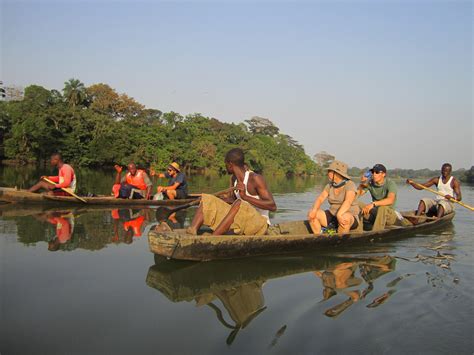 dugout canoeing on moa and mel river sierra leone heroes of adventure